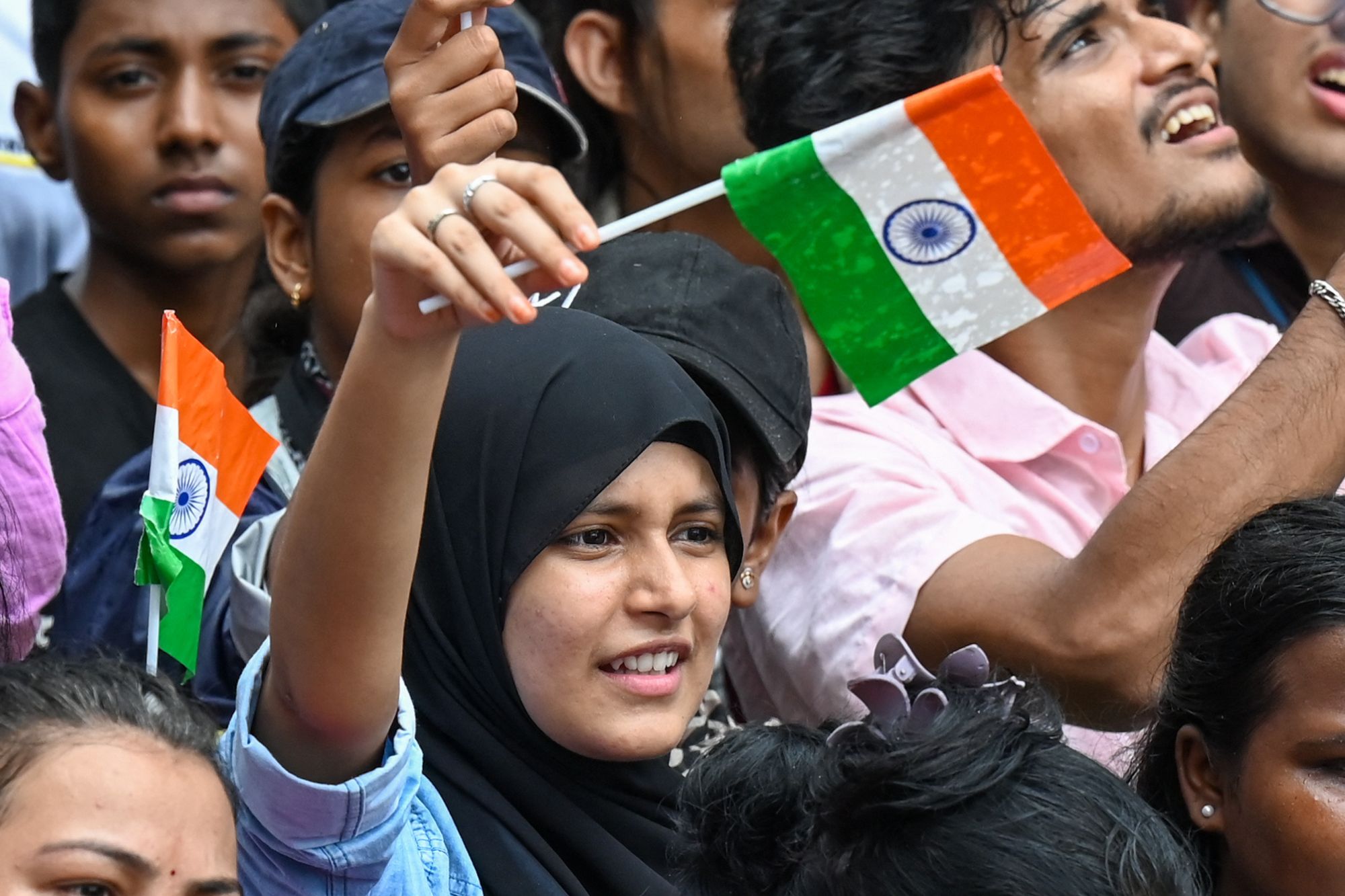 Ragazza manifesta in India - Afp